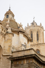 Tarragona Cathedral, Tarragona, Catalonia, Spain. Features unique medieval sculptures of apostles and prophets on its grand entrance, including rare female biblical figures—unusual in Gothic portals.