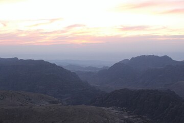 Obraz premium Sunset Over Ancient Mountains in Jordan