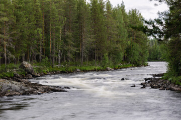 Flowing long exposure water at Kittelforsen, Idre