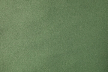 Dark green paper backdrop with noise texture
