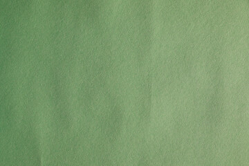 Green wallpaper background with creased and noise texture