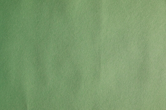 Green wallpaper background with creased and noise texture