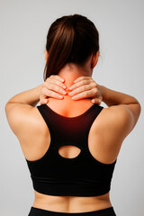 Young Fit Woman Holding Neck in Pain Injury Awareness Concept