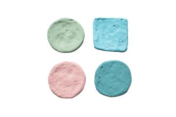 four different colored clays are arranged in a row