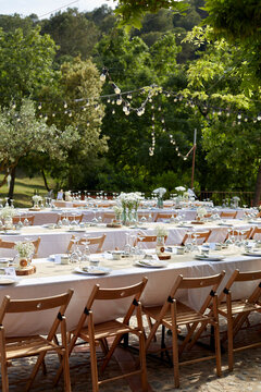 Outdoor wedding tables with elegant floral decorations