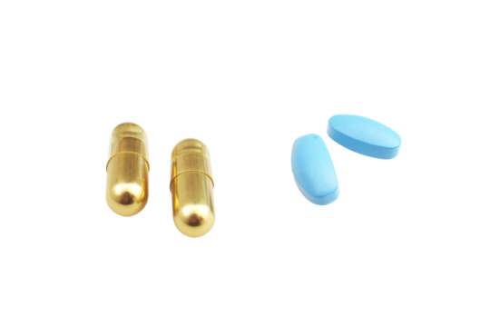 a couple of pills sitting next to each other