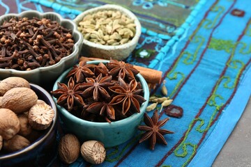 Different aromatic spices on table, closeup. Space for text