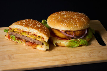 Fastfood close -up: Fresh Burger with meat and vegetables