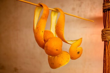 Orange peels hang to dry. A pleasant rustic colonial setting.