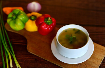 Vegetable Clear Soup With Bread Roll