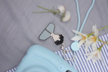 Flat Lay Anime Character Acrylic Keychain Styled Still Life Arrangement