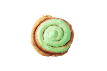 a pastry with green frosting on top of it