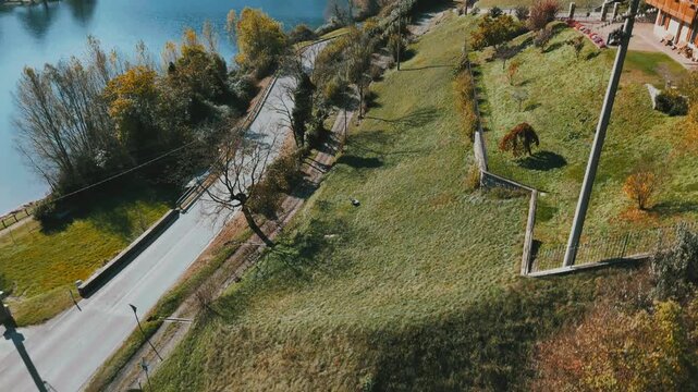 Drone view over Lake Idro in northern Italy revealing serene blue waters and forested slopes