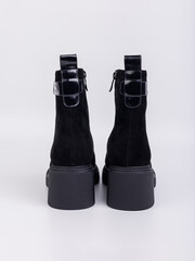 Discover our fashionable and stylish black ankle boots, featuring a trendy platform sole and...