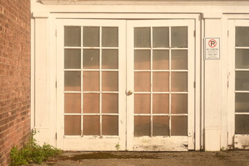 Obraz premium Glass doors framed with faded white paint