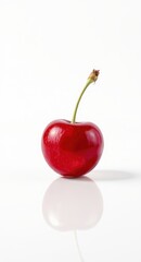 Single Ripe Red Cherry with Stem and Reflection