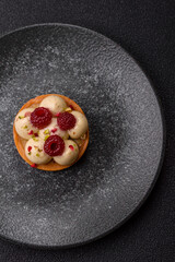 Sweet cake or tart round with cream and raspberries. Raspberry sweet tart