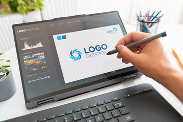 Graphic designer logo creator on screen