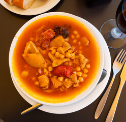 National Spanish dish tripe Callos a la Gallega - thick broth with chickpeas