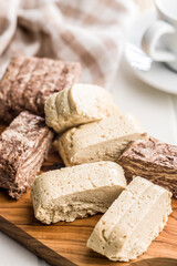 Halva. Sweet oriental dessert on cutting board.
