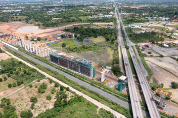 New construction site with crane and mechanical equipments on blue sky background, Infrastructure of high-speed train construction site of Chinese made FuxingHao, base from CR400AF for transportation.