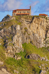 Saint John the Baptist Chapel of hermitage located on the rocky Gaztelugatxe island in the Basque...