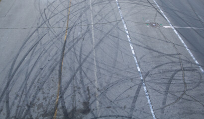 Dynamic Skid Mark Patterns on Weathered Asphalt Surface