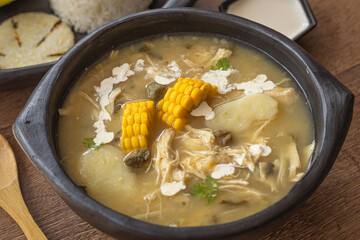 Traditional Colombian Ajiaco with Rice, Avocado and Arepa