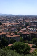Obraz premium Aerial view, panoramic cityscape of Bergamo with green hills and classic architecture, Italy