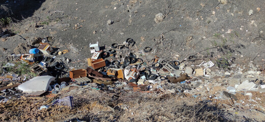 Environmental Pollution, Garbage Dumped in a Natural Ravine. sustainability and environment concept