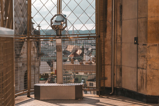 Scenic city view with observation deck telescope