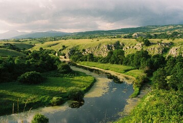 Naklejka premium Landscape with river in the mountains