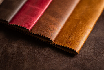 Leather Swatches in Rich Tones Red, Brown and Cognac Faux Leather Samples on Dark Background