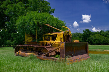 Time Forgotten: Overgrown Rusty Bulldozer in a Meadow