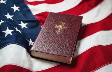 A closed maroon Bible with a gold embossed cross rests on the American flag. This image symbolizes the intersection of faith and patriotism, suggesting Christian values are foundational to the nation.