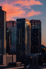 bright summer sunset against skyscrapers in downtown seattle