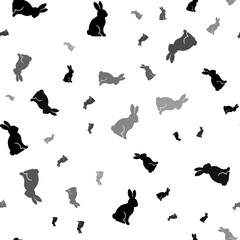 Seamless vector pattern with rabbit symbols, creating a creative monochrome background with rotated elements. Illustration on transparent background