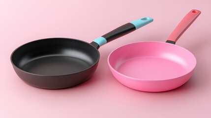 Two colorful frying pans sit side-by-side against a pink background.