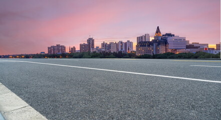 outdoor road skyline city building landscape sky sunset cityscape street travel
