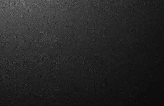 Close-up macro texture of black polyethylene foam sheet. Material features fine, rough, porous, cellular surface with industrial, matte finish. Ideal for cushioning, insulation, as background design