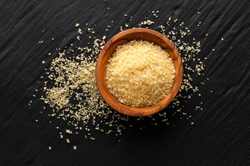 Yellow Japanese panko crumbs in the bowl