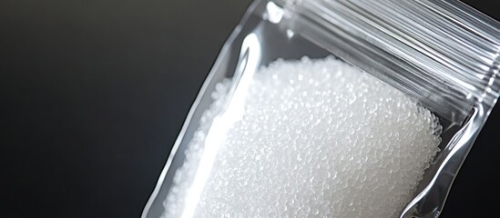 Bag of Granular Substance  Crystal Clear Close-Up of a Plastic Bag Filled with White Granules for Science and Medical Research.