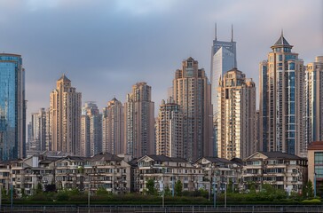 Obraz premium City skyline with modern and older buildings.