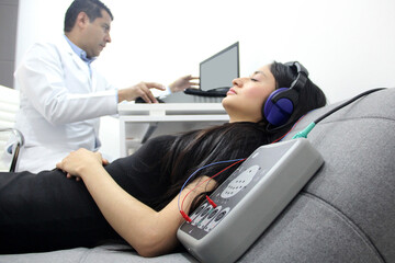 Auditory Evoked Potentials, a diagnostic test to evaluate the auditory system function of a 20-year-old female patient