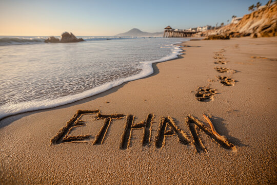 Name Ethan Handwritten in Tan Beach Sand with Natural Human Strokes and Ocean Tidal Elements in the Background