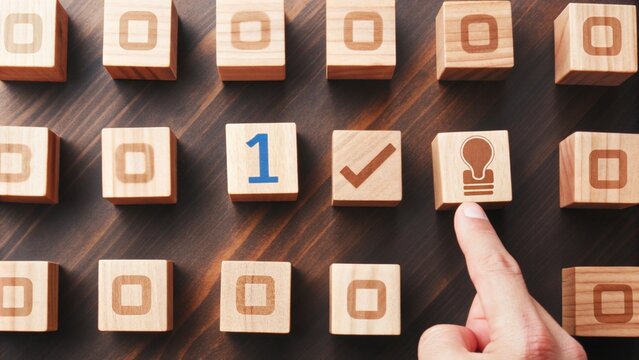 The Number One and Icons on Wooden Cubes Creative Selection and Decision Concept