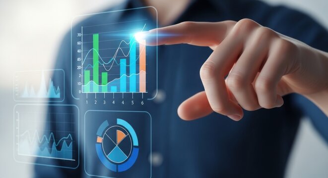 Photo of a hand touches a digital screen displaying data analytics, charts, and graphs, representing the future of business technology and virtual interfaces