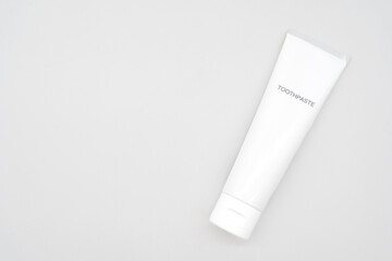 Minimal White Toothpaste Tube with Copy Space. White toothpaste tube with simple 