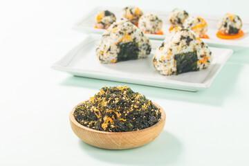 A plate of pork floss and seaweed