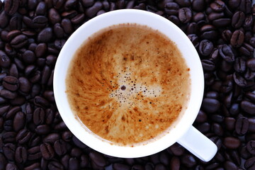 Cup of Coffee with Coffee Beans
